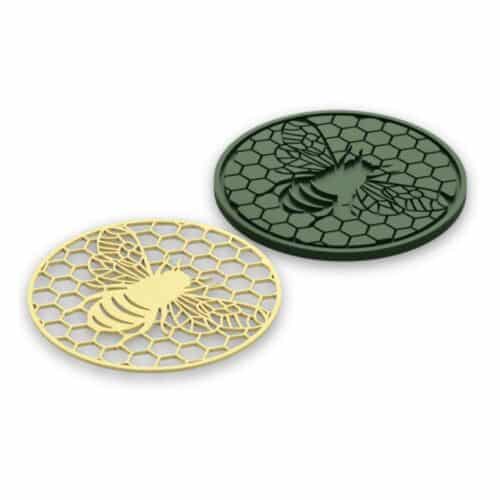 Posavasos redondos con diseño de abeja y panal.