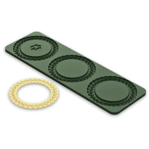 Three laurel wreath molds, one loose.