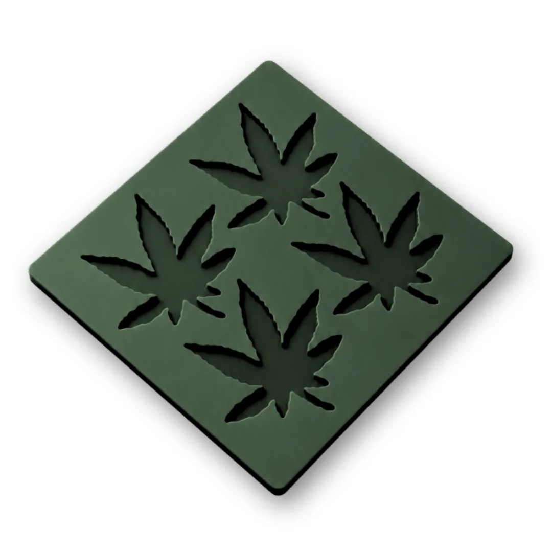 Four cavity hemp leaf silicone tuile mold on a white background