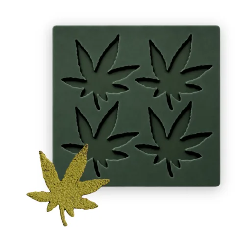 Cannabis leaf tuile mold with four silicone cavities and a finished leaf tuile