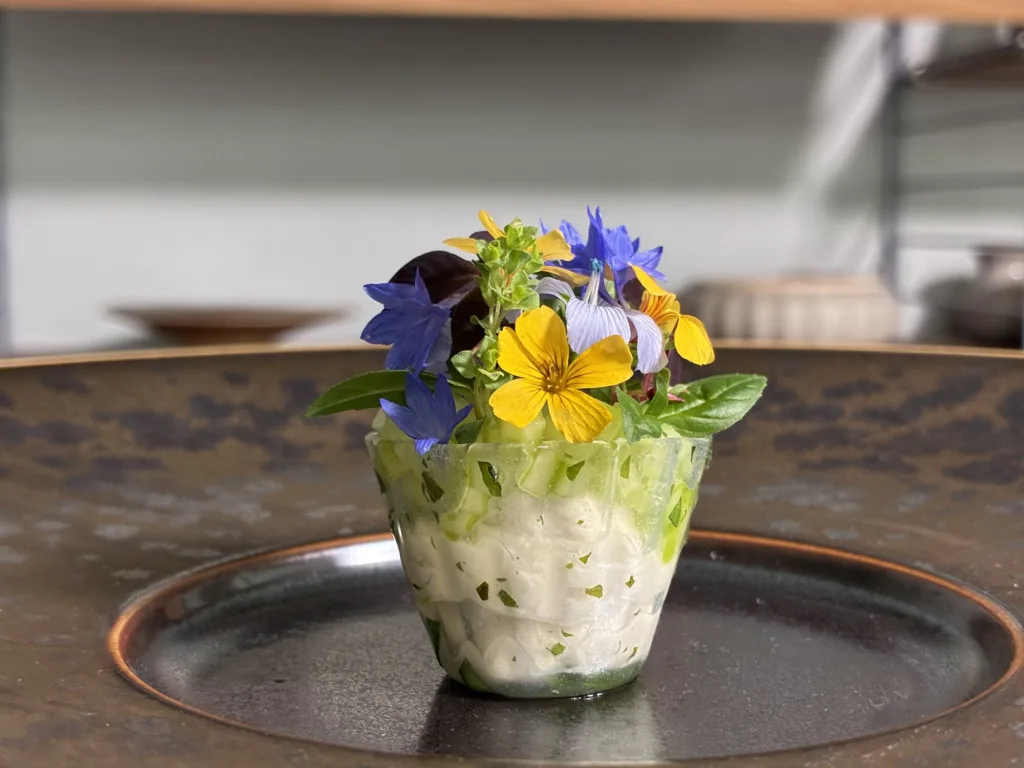Lemon gel croustade with whipped sour cream, salted cucumber and garden herbs