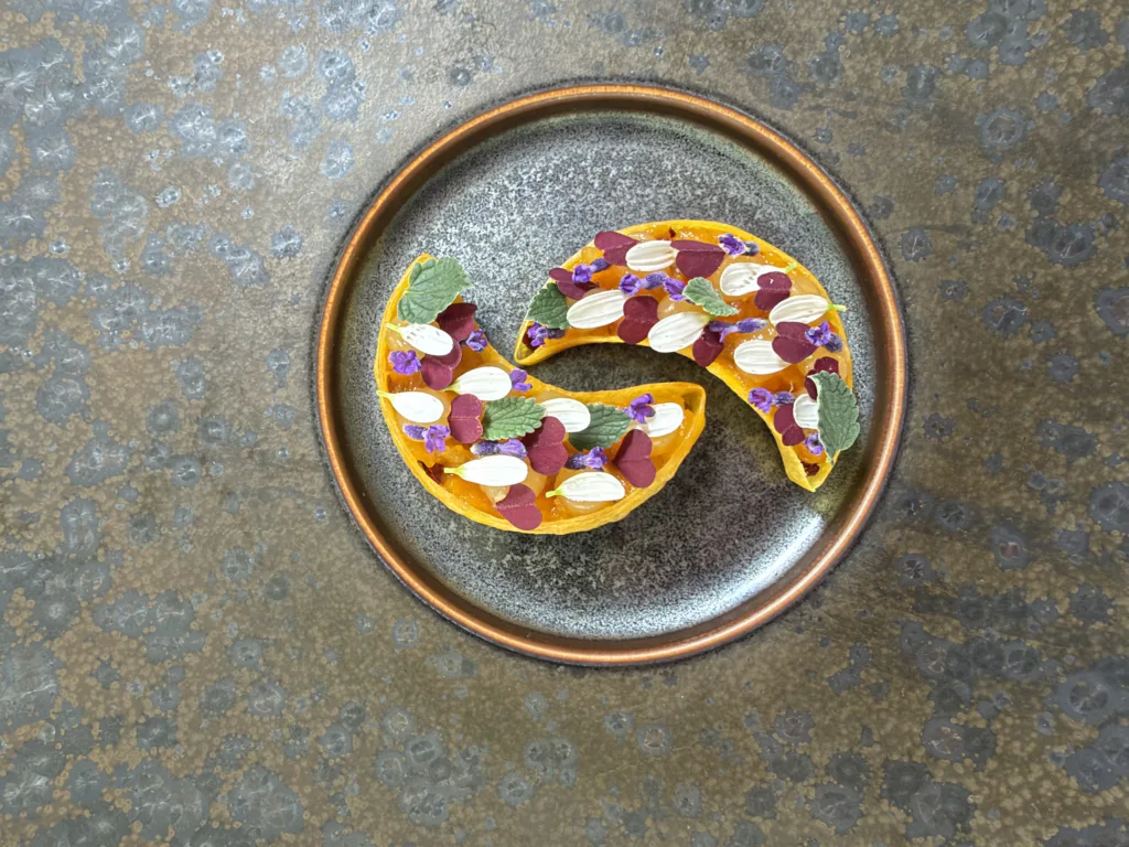 Spiced pumpkin pie tee shells with cranberry chutney, pumpkin jam, orange gel and edible flowers by Arnis Ansons